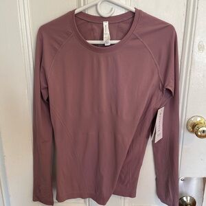 Athleta New Women’s long sleeve Momentum top